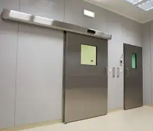 puerta deslizante automática que abre hacia la izquierda con ventana de vidrio integrada